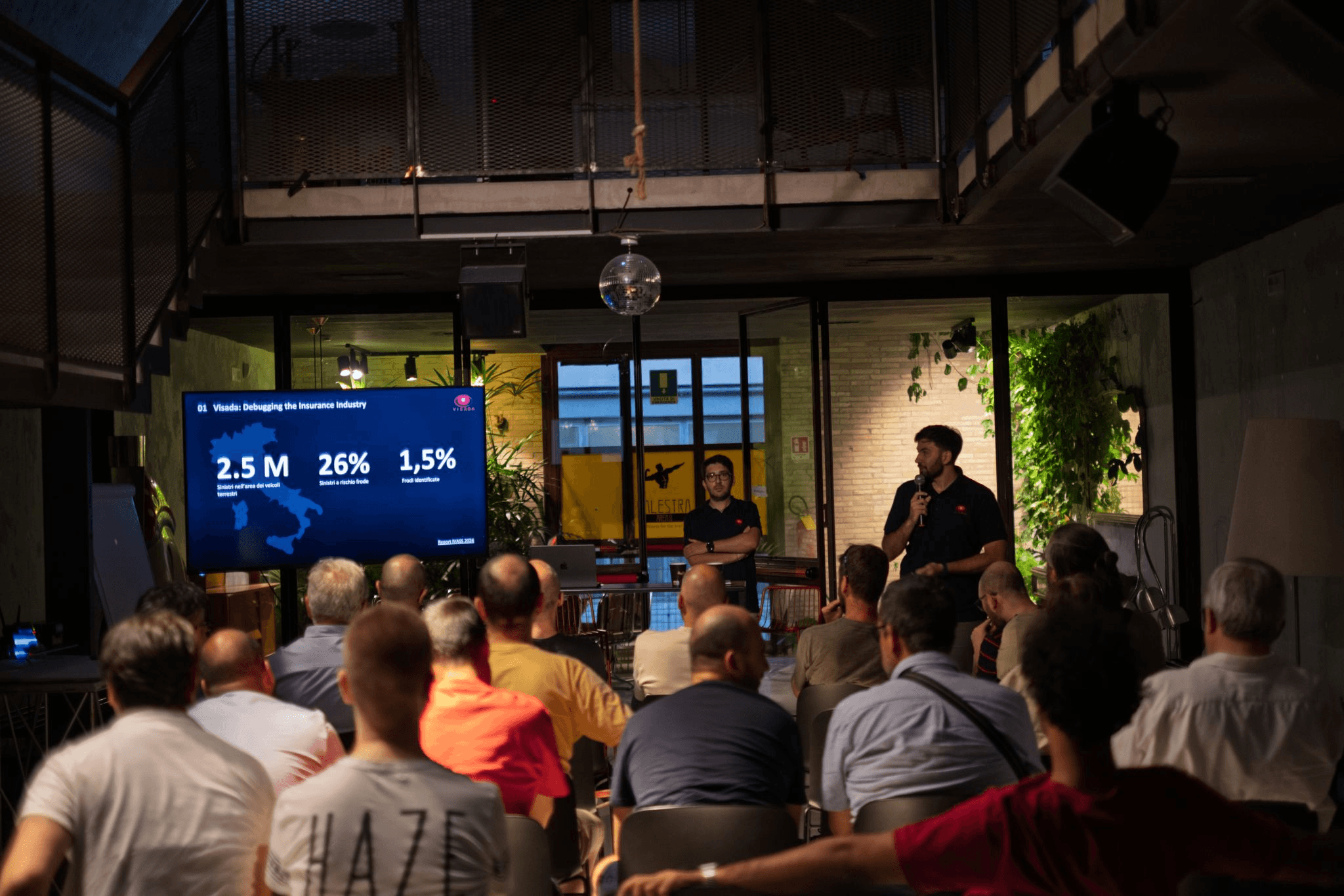 Matera Tech Talk stage with slide showing antifrode AI pipeline